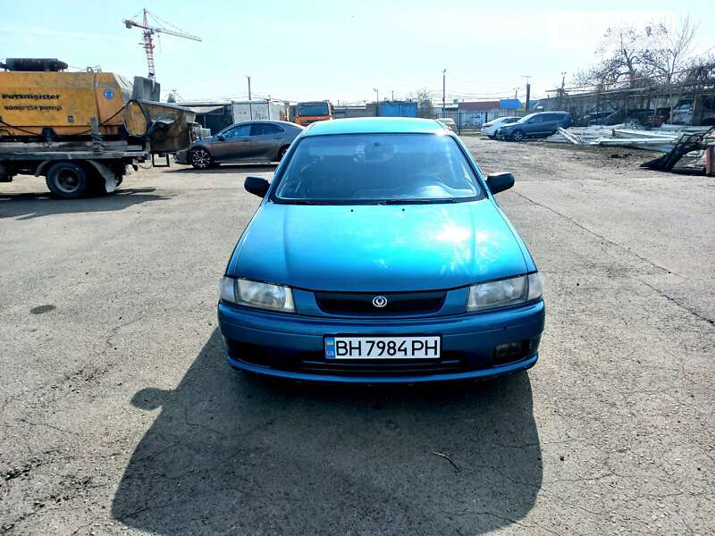 Седан Mazda 323 1998 в Одесі фото 5 Седан Mazda 323 1998 в Одесі