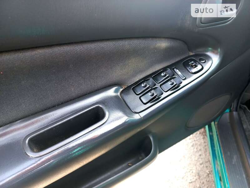 Седан Mazda 323 1998 в Одесі фото 17 Седан Mazda 323 1998 в Одесі