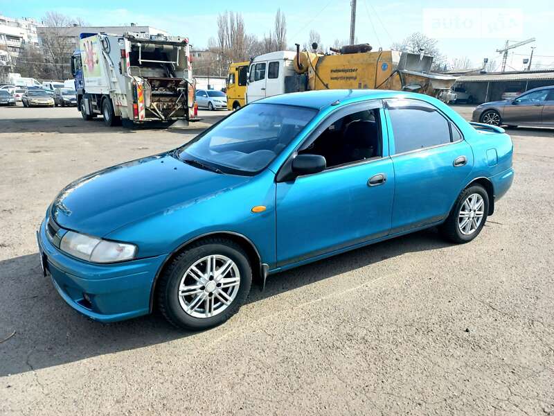 Седан Mazda 323 1998 в Одесі фото 20 Седан Mazda 323 1998 в Одесі