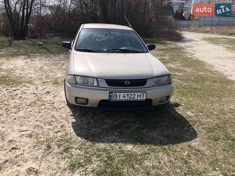 Седан Mazda 323 1998 в Кременчуге фото 7 Седан Mazda 323 1998 в Кременчуге