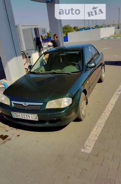 Седан Mazda 323 1998 в Захарьевке