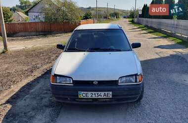Седан Mazda 323 1993 в 