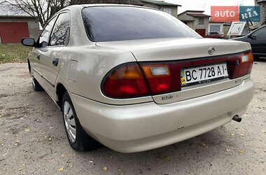 Седан Mazda 323 1996 в Буске