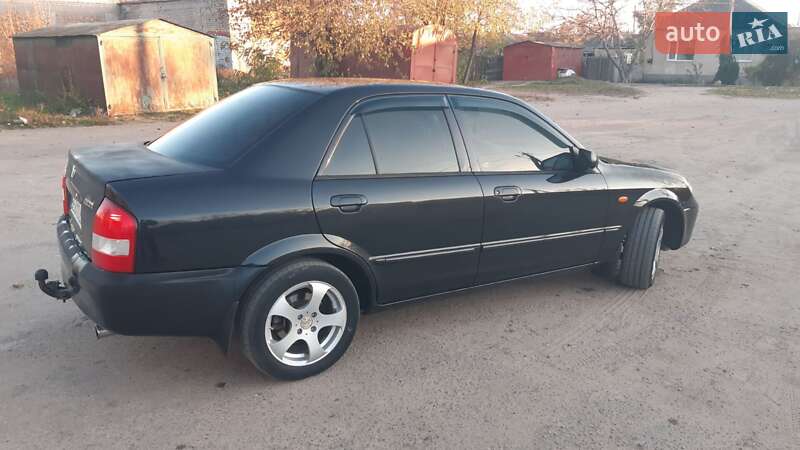 Седан Mazda 323 2002 в Вознесенске