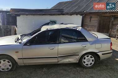 Седан Mazda 323 1999 в 