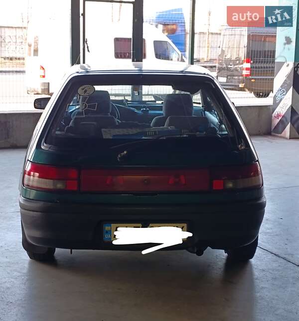 Хэтчбек Mazda 323 1992 в Киеве фото 10 Хэтчбек Mazda 323 1992 в Киеве