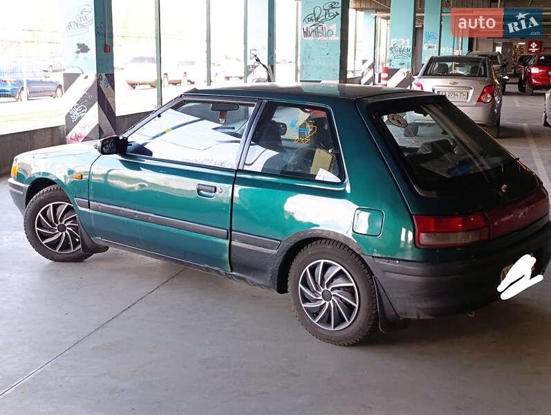 Хэтчбек Mazda 323 1992 в Киеве фото 12 Хэтчбек Mazda 323 1992 в Киеве