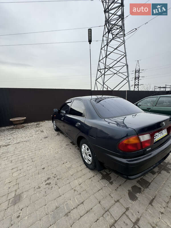 Седан Mazda 323 1997 в Одессе фото 4 Седан Mazda 323 1997 в Одессе