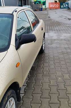 Седан Mazda 323 1996 в 