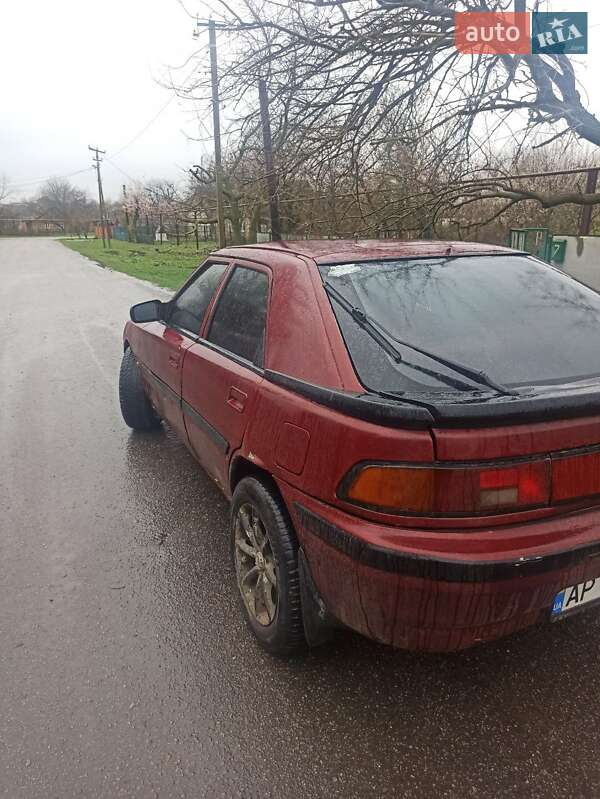 Хетчбек Mazda 323 1993 в Чумаках фото 2 Хетчбек Mazda 323 1993 в Чумаках