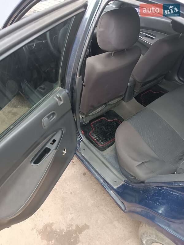 Седан Mazda 323 1997 в Шептицькому фото 9 Седан Mazda 323 1997 в Шептицькому