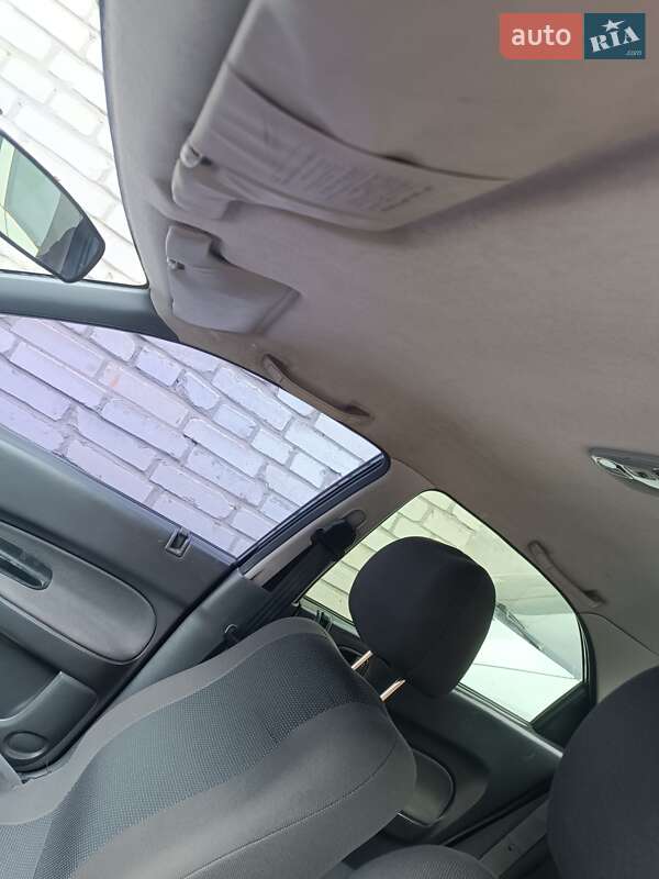 Седан Mazda 323 1997 в Шептицькому фото 15 Седан Mazda 323 1997 в Шептицькому