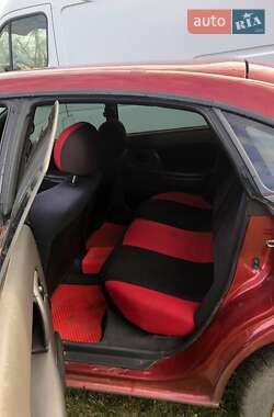 Хетчбек Mazda 323 1997 в 