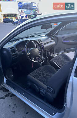 Хэтчбек Mazda 323 1998 в 