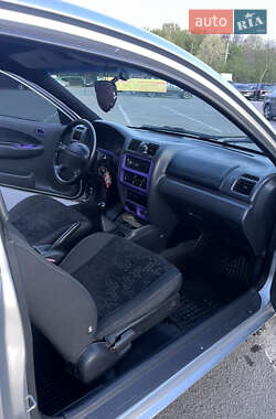 Хэтчбек Mazda 323 1998 в 