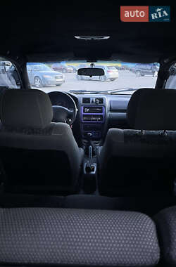 Хэтчбек Mazda 323 1998 в 