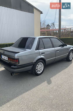 Седан Mazda 323 1986 в 