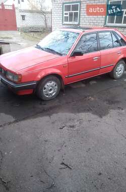 Хетчбек Mazda 323 1987 в 