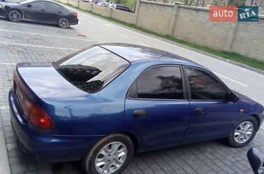 Хетчбек Mazda 323 1996 в 