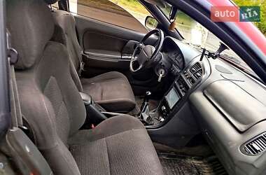 Хэтчбек Mazda 323 1994 в 