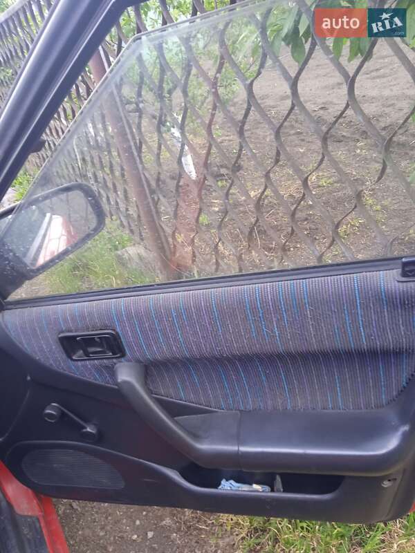 Хэтчбек Mazda 323 1994 в Кременчуге фото 4 Хэтчбек Mazda 323 1994 в Кременчуге