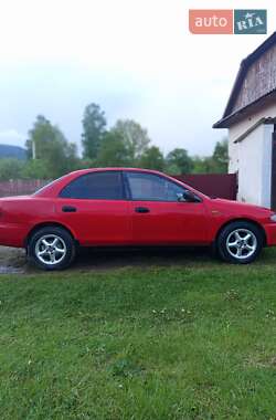 Седан Mazda 323 1994 в Порогах