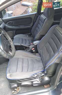 Хетчбек Mazda 323 1996 в 