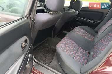 Хетчбек Mazda 323 1997 в 