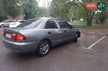 Седан Mazda 323 1995 в 
