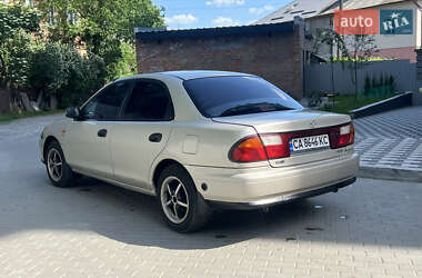 Седан Mazda 323 1998 в 