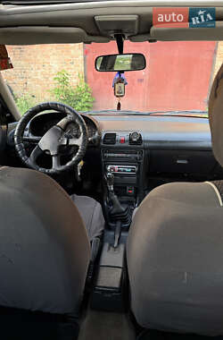 Хетчбек Mazda 323 1995 в 