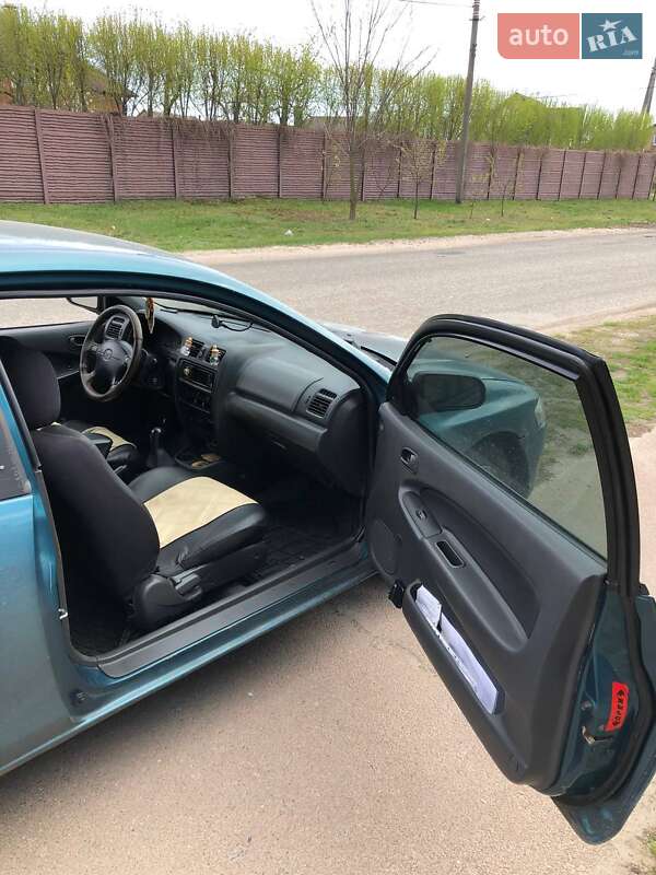 Хэтчбек Mazda 323 1997 в Киеве фото 9 Хэтчбек Mazda 323 1997 в Киеве
