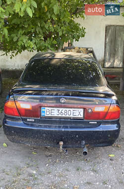 Седан Mazda 323 1995 в Новом Буге