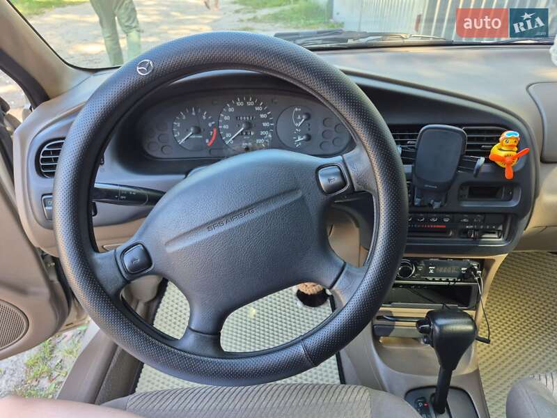 Седан Mazda 323 1997 в Березному