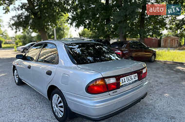 Седан Mazda 323 1998 в 