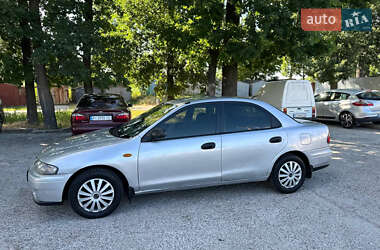 Седан Mazda 323 1998 в 