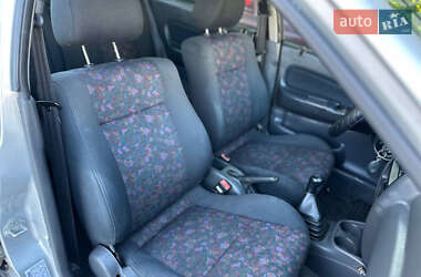 Седан Mazda 323 1998 в 