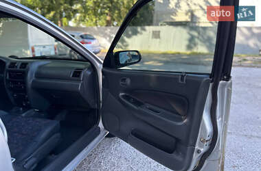 Седан Mazda 323 1998 в 