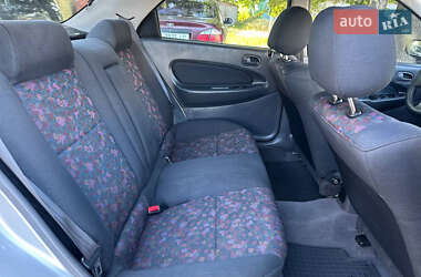 Седан Mazda 323 1998 в 
