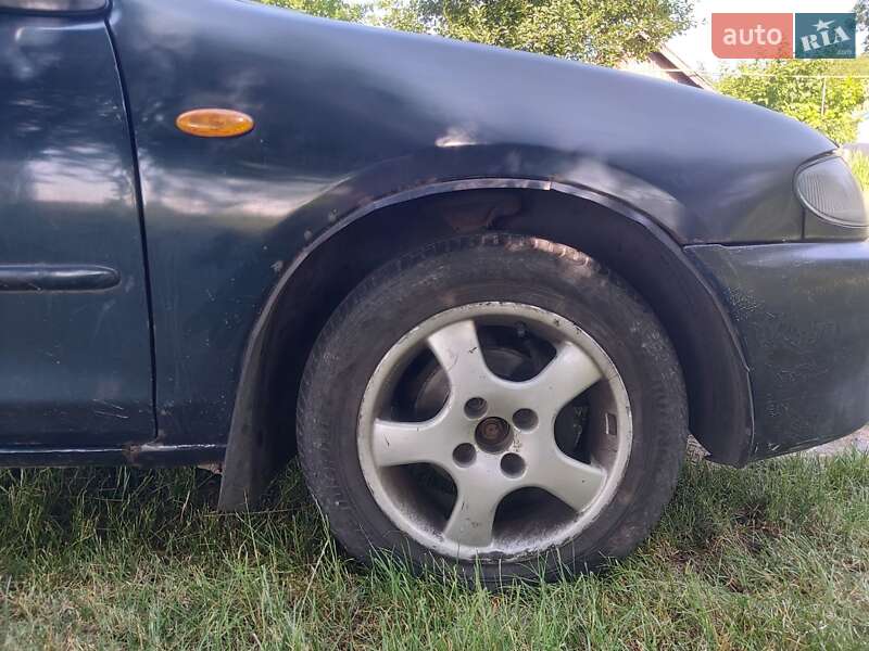 Седан Mazda 323 1995 в Хмельницком фото 8 Седан Mazda 323 1995 в Хмельницком