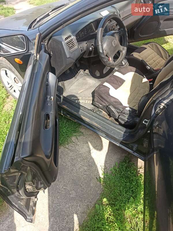 Седан Mazda 323 1998 в Белой Церкви фото 17 Седан Mazda 323 1998 в Белой Церкви