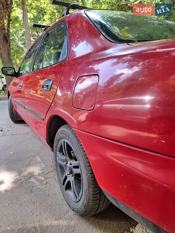 Седан Mazda 323 1996 в Одессе
