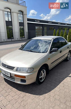 Седан Mazda 323 1996 в Буську