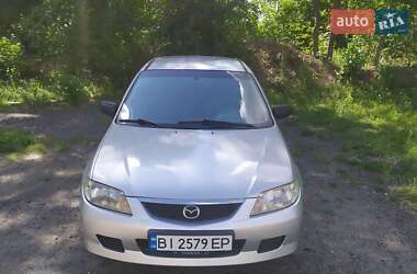 Хэтчбек Mazda 323 2003 в 