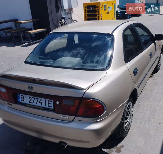 Mazda 323, фото з оголошення
