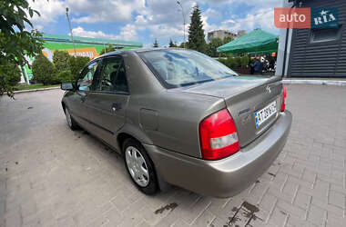 Седан Mazda 323 1999 в 