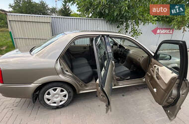 Седан Mazda 323 1999 в 