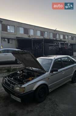 Хэтчбек Mazda 323 1987 в 