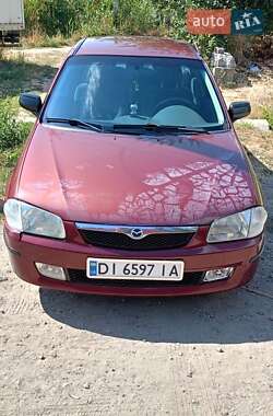Седан Mazda 323 1999 в 