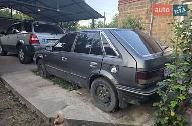 Хэтчбек Mazda 323 1987 в 
